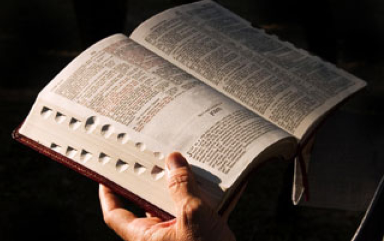 bible-study-man-holding-bib.